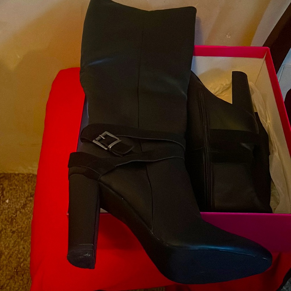 Women’s Size  11  heeled boots Black leather with suede strap buckle on ankle